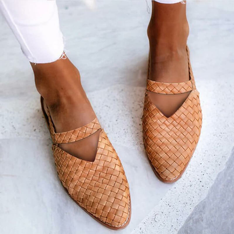 Trendy women's chic sandals with unique style, ideal for casual summer fashion. Comfortable slip-on footwear.
