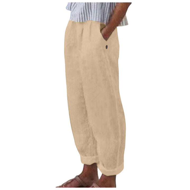 Close-up of comfortable fabric on women's relaxed fit trousers, highlighting quality texture for stylish casual wear.