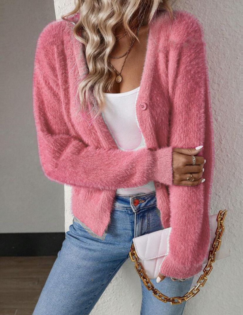 Cozy women's fluffy knit V-neck cardigan featuring chic button details for a fashionable look.