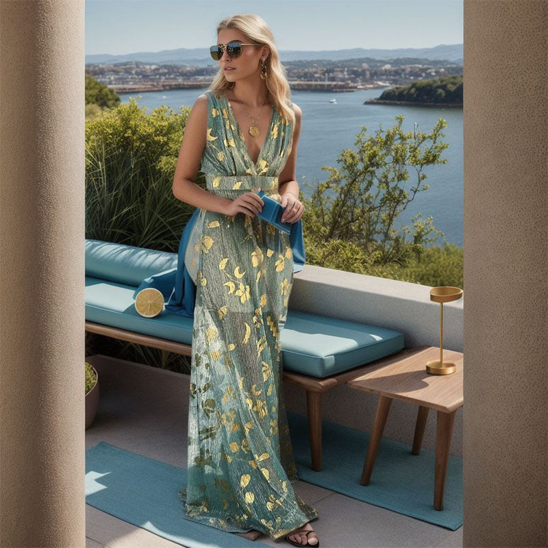 Flowing V-neck maxi dress for women, featuring a stunning gold pattern. Ideal elegant evening gown.