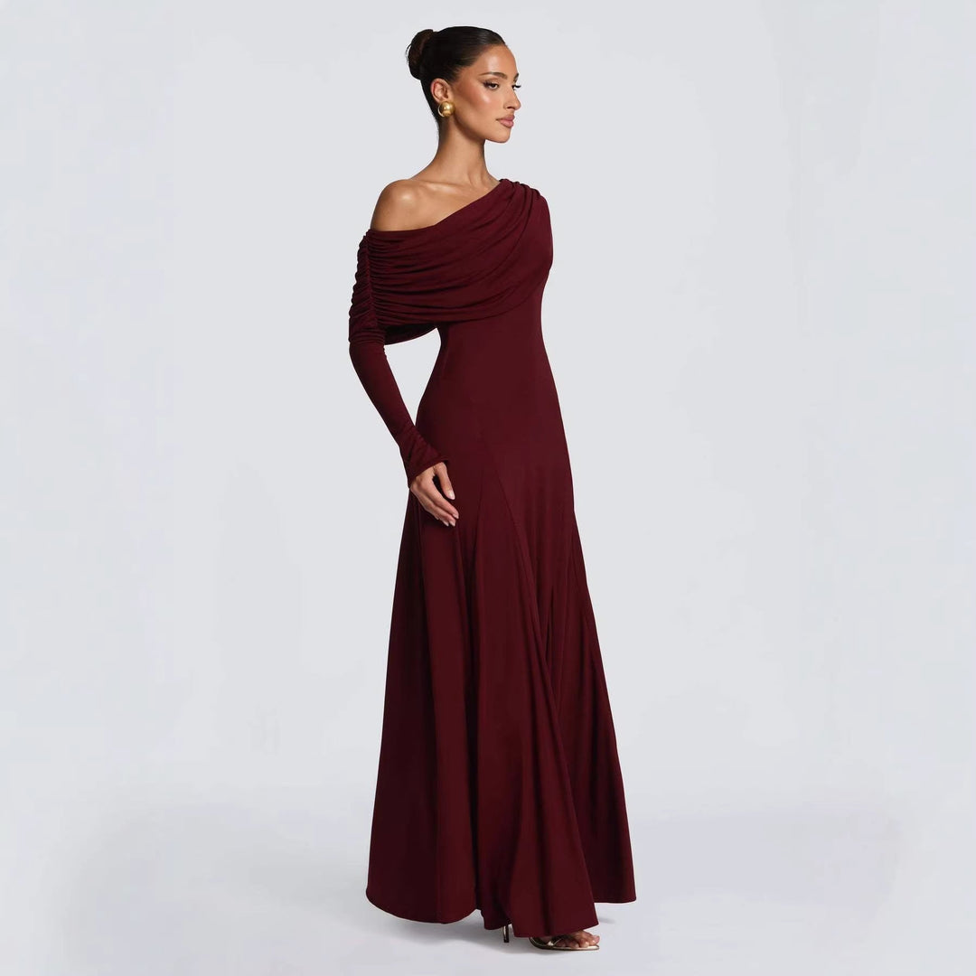 Stunning long sleeve maxi evening gown for women, featuring elegant asymmetrical draping and a flattering silhouette.