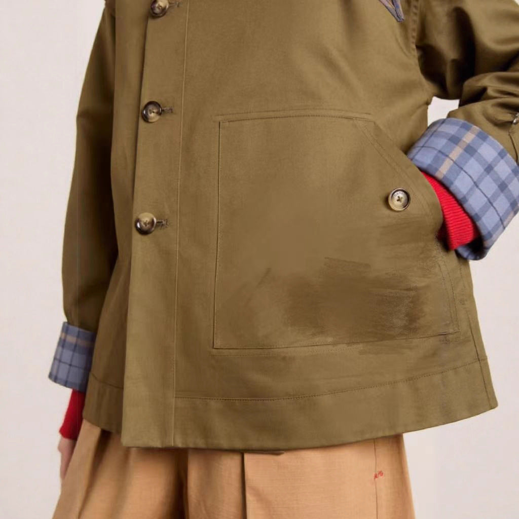 Versatile women's brown trench coat, ideal elegant outerwear for chic fall fashion or spring outfits.