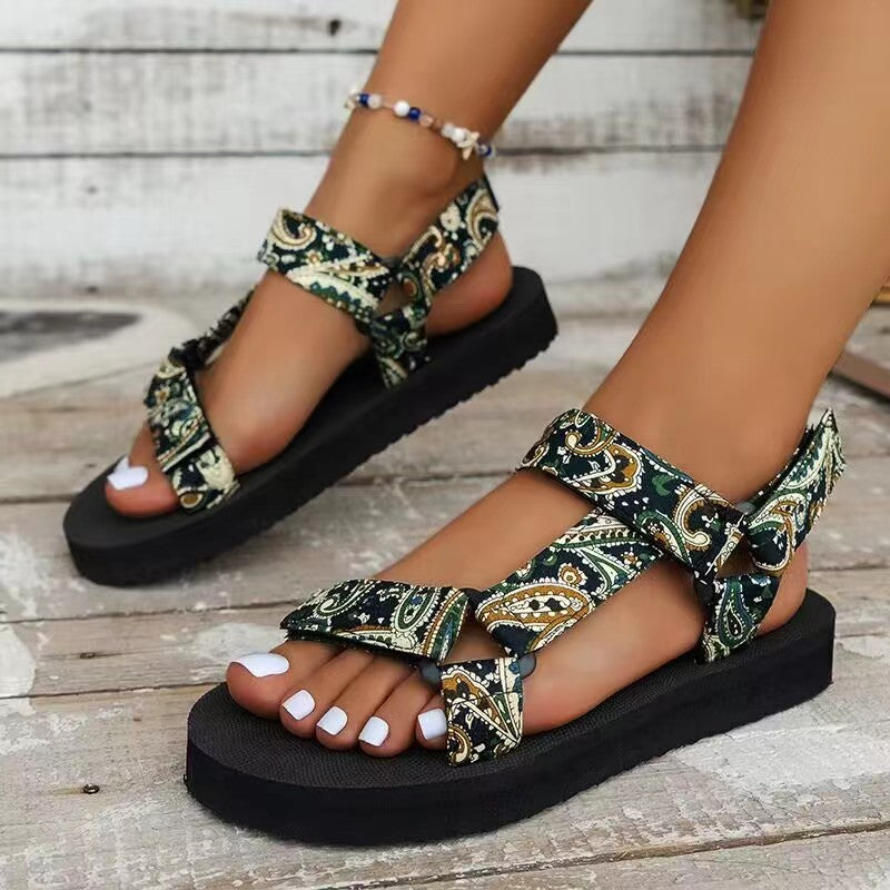 Rhinestone-embellished vibrant women's orthopedic flat sandals for comfortable beachwear.