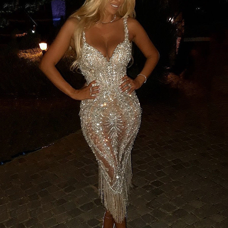 Glamorous women's sequin fringe evening dress with V-neck, perfect for parties & formal occasions.