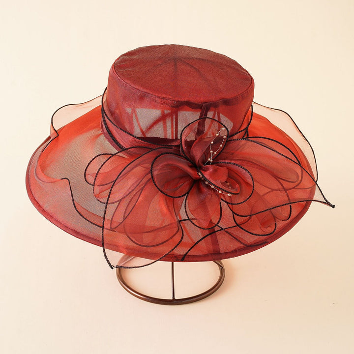 Fashionable women's mesh sun hat with a romantic bow, an elegant summer accessory for ladies.