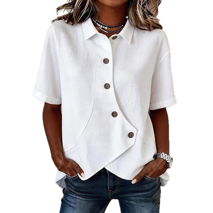 Stylish spring/summer blouse for women, featuring a soft wavy print and unique front button detailing.