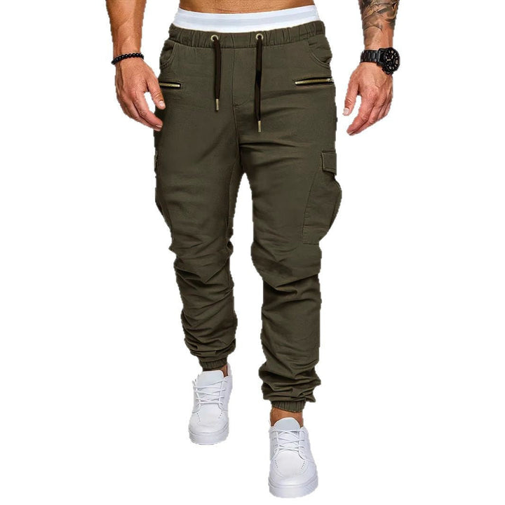 Men's comfortable athletic cargo pants, elastic waist, and secure zip pockets, suitable for jogging and active wear.
