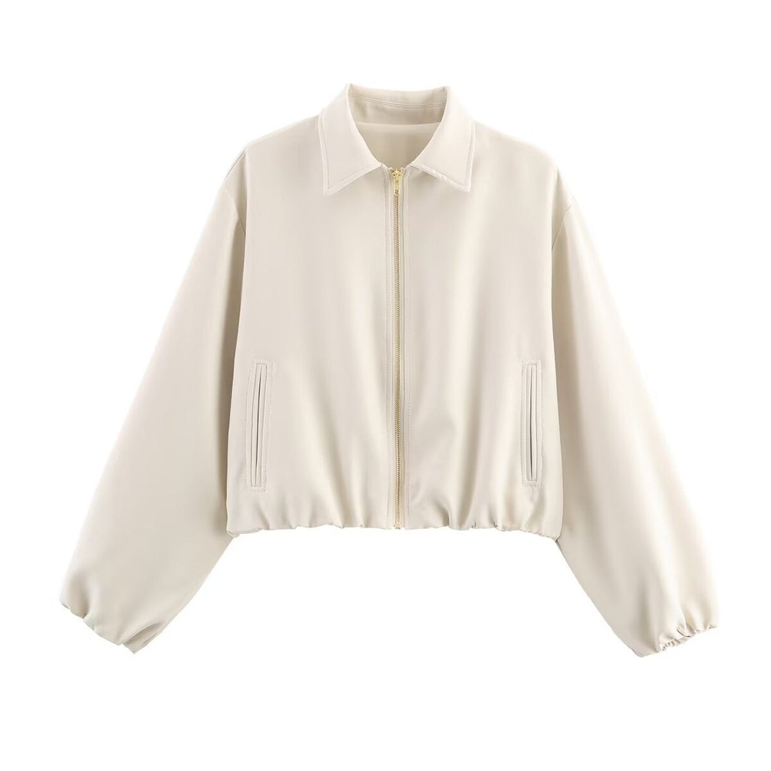 Modern women's zip-up short jacket, ideal for layering and versatile casual outfits.