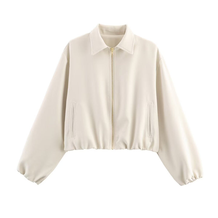 Modern women's zip-up short jacket, ideal for layering and versatile casual outfits.