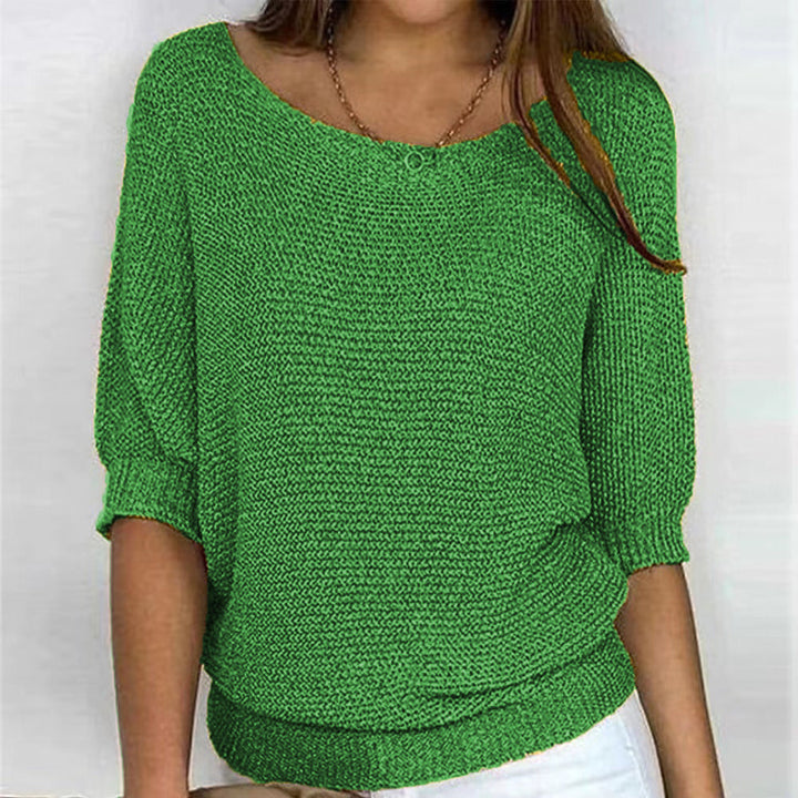 Soft knit women's pullover sweater with long sleeves, perfect for cozy fall fashion and comfortable everyday wear.