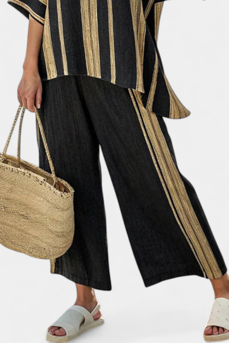 Cozy multi-colored striped oversized top & relaxed fit pants matching set, perfect for versatile vacation outfits.