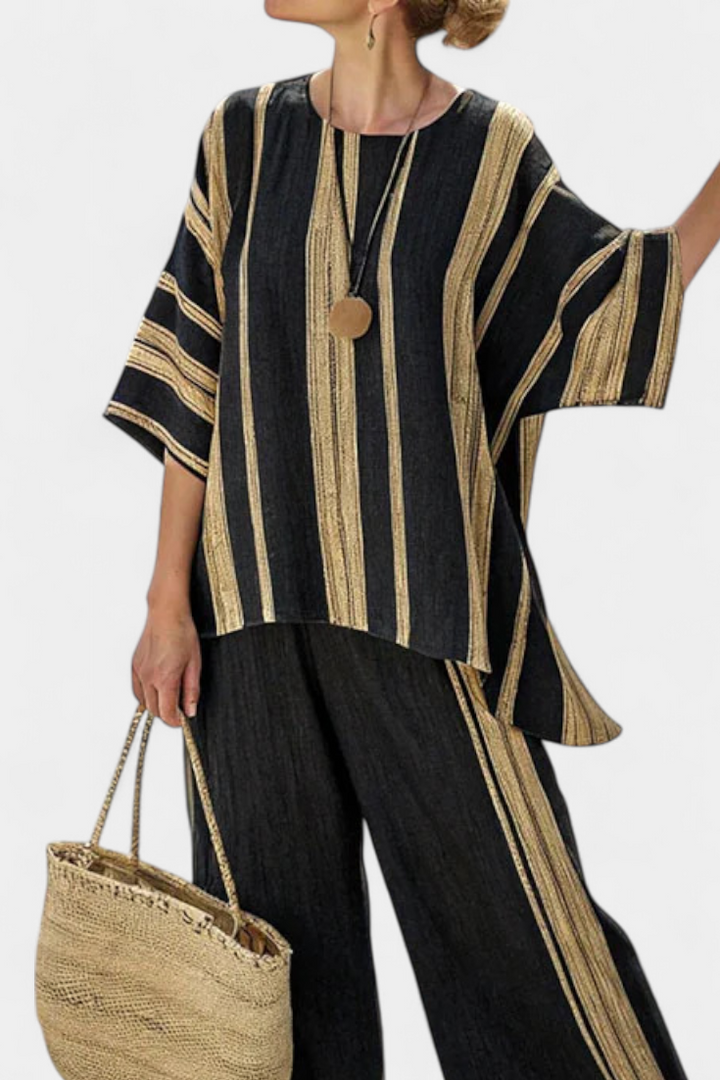 Oversized multi-striped long-sleeve top & relaxed fit wide-leg pants women's two-piece set, spring fashion.