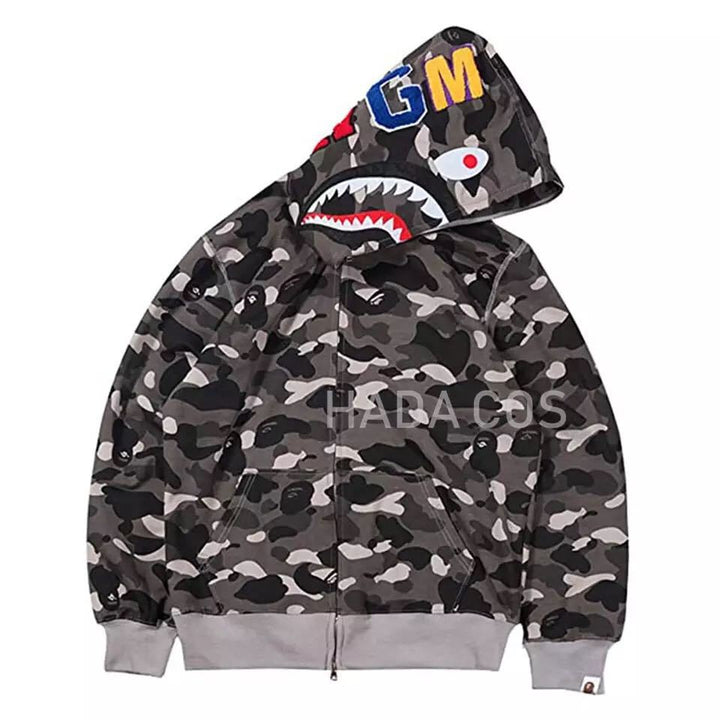 Close-up of women's camouflage print hooded sweatshirt. Trendy activewear fashion top with unique pattern.