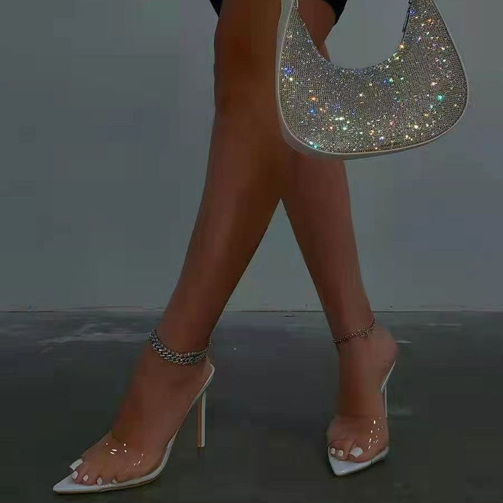 Elegant transparent high-heel mules for women, offering a seductive and fashionable appearance.