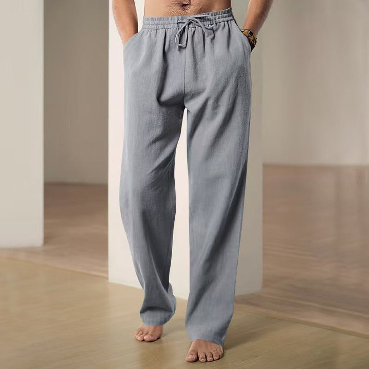 Comfortable men's summer pants, relaxed fit with elastic waist, perfect for beachwear and leisure.