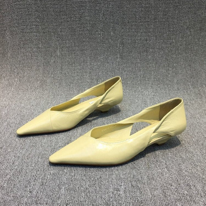 Professional women's pointed toe ballet flats for office wear, providing all-day comfort.