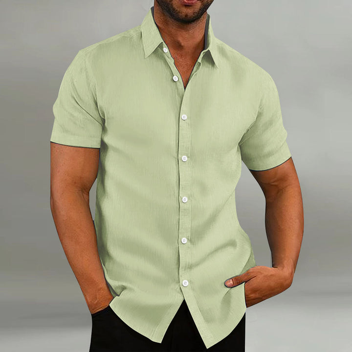 Comfortable men's casual short sleeve shirt featuring a neat button placket for versatile style.
