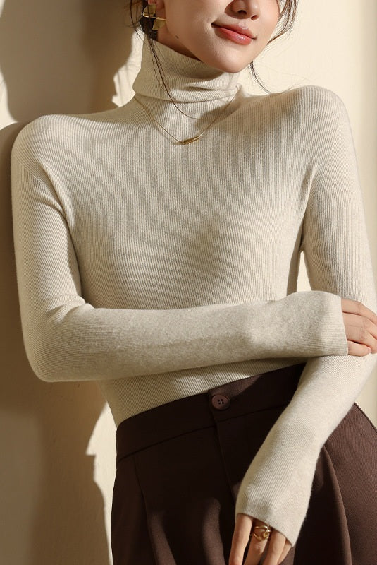 Stylish women's slim fit high neck sweater, long sleeve and seamless, perfect for office wear & casual outfits.