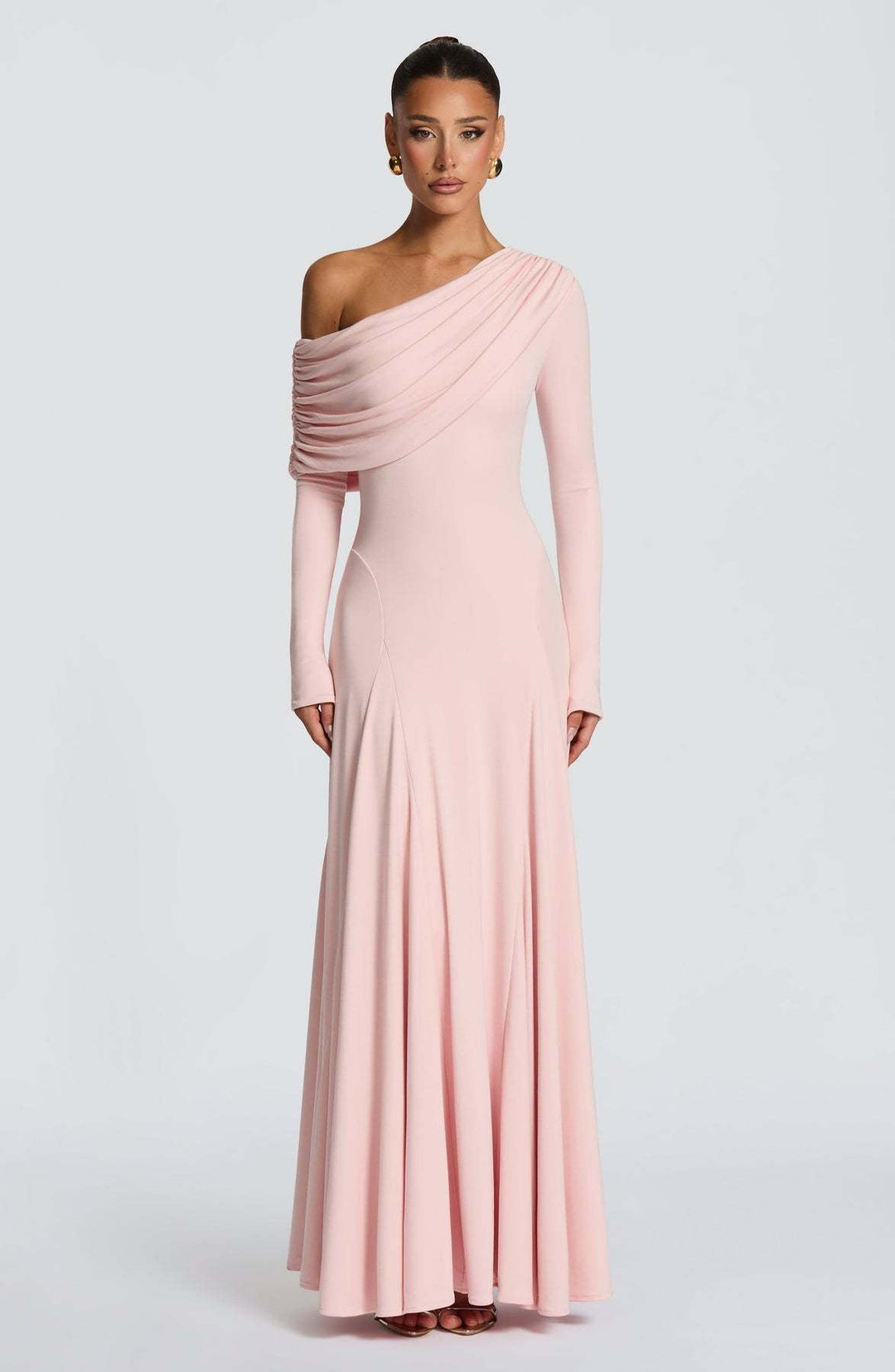 Flowing women's long sleeve maxi dress, elegant and sophisticated with asymmetrical draping, ideal for formal wear.