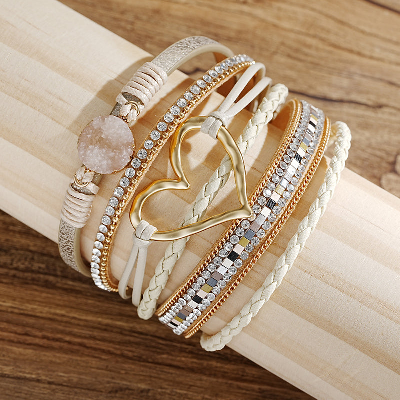 Natural stone and rhinestone heart charm bracelet for women, embodying a beautiful bohemian style.