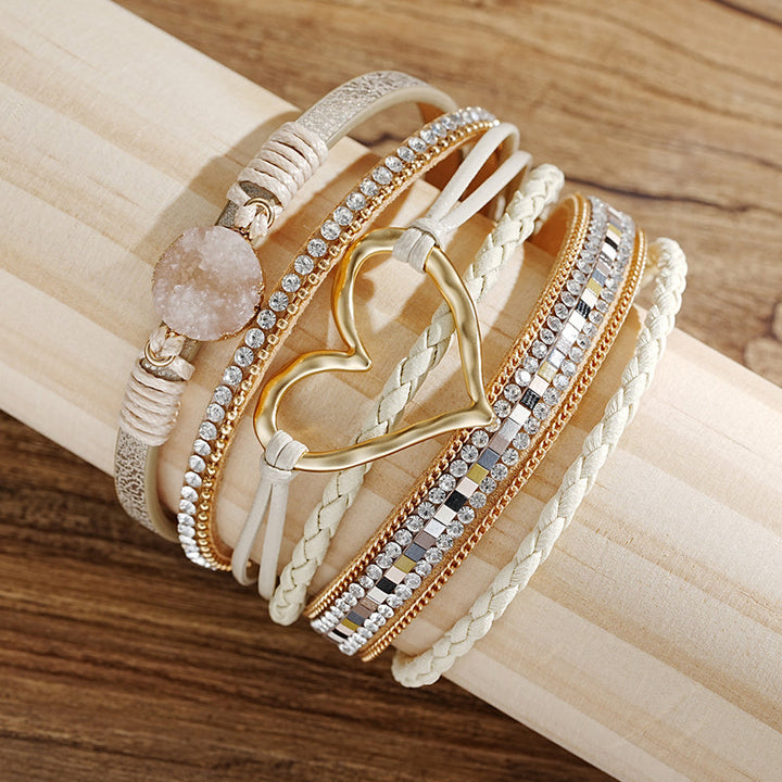 Natural stone and rhinestone heart charm bracelet for women, embodying a beautiful bohemian style.