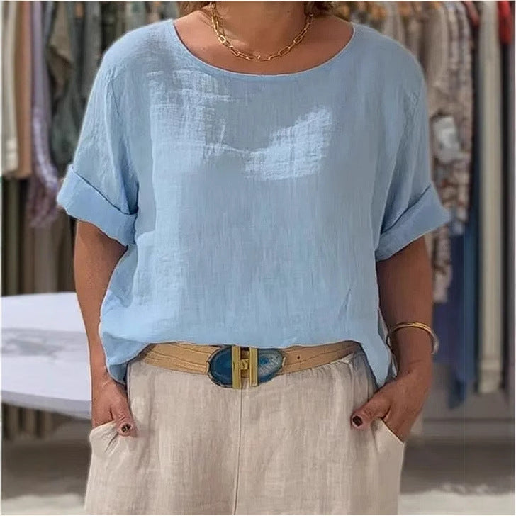 Women's lightweight relaxed fit blouse with rolled sleeves. Perfect for casual summer style.