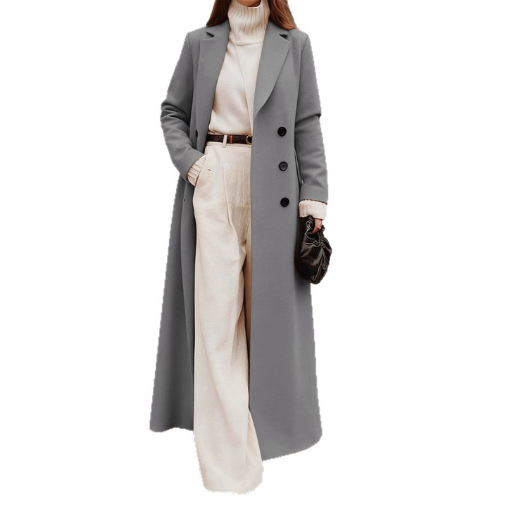 Classic women's double-breasted outerwear, a long jacket with deep pockets for winter elegance.