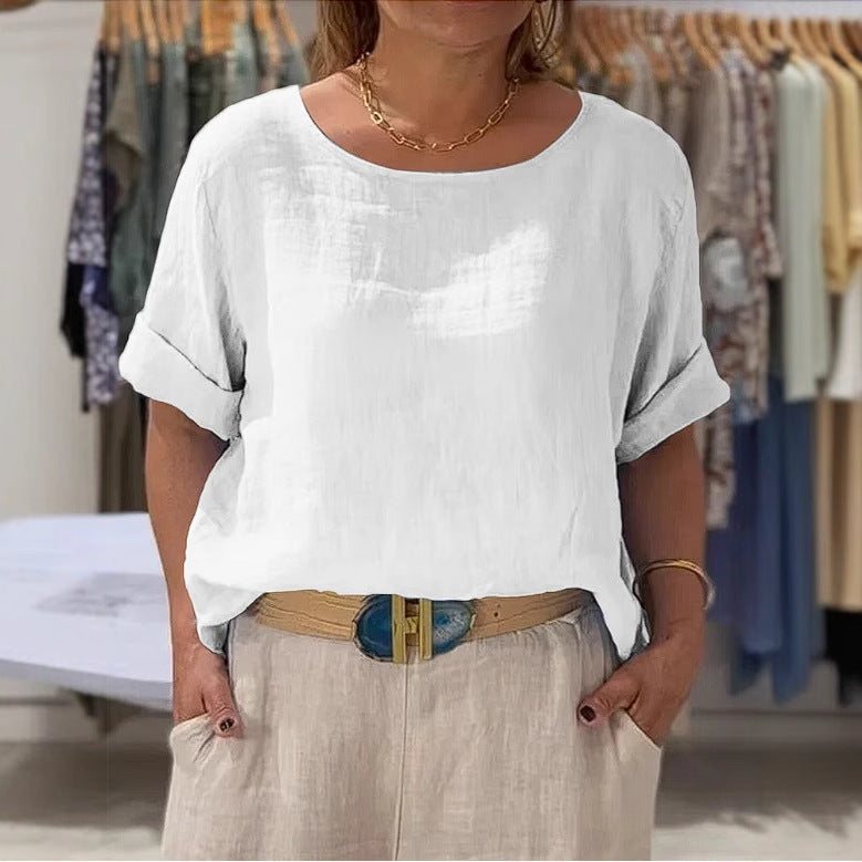 Sky blue women's lightweight blouse, relaxed fit, rolled sleeves. Stylish for spring/summer fashion.