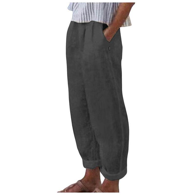 Women's relaxed fit trousers styled in a chic, comfortable everyday outfit, highlighting versatile fashion and ease.