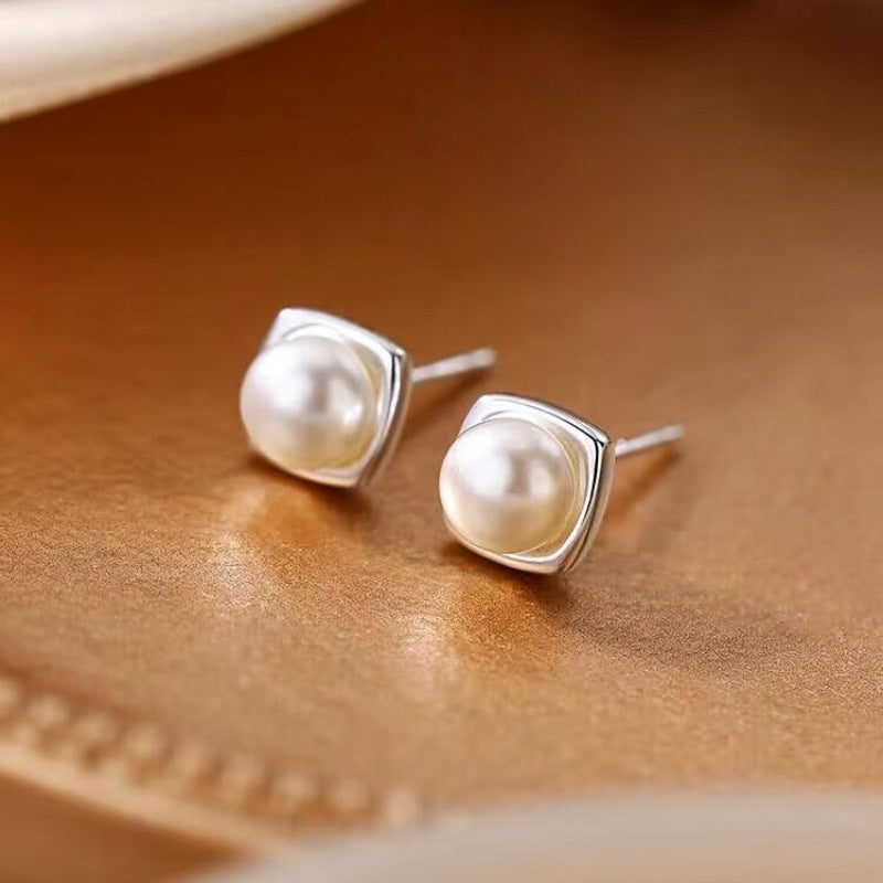 Elegant women's classic freshwater pearl drop earrings. Timeless design, perfect for sophisticated style.