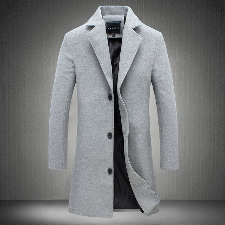 Autumn/winter women's long jacket, elegant structured outerwear for ladies.