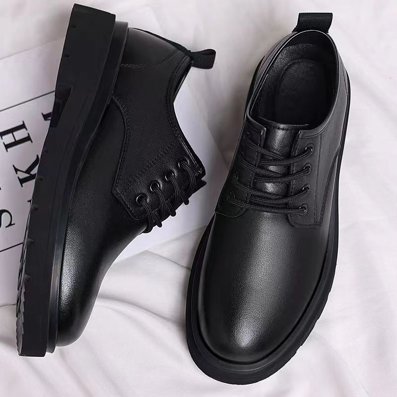 Stylish men's classic oxfords. Black lace-up dress shoes perfect for formal events or versatile business casual fashion.