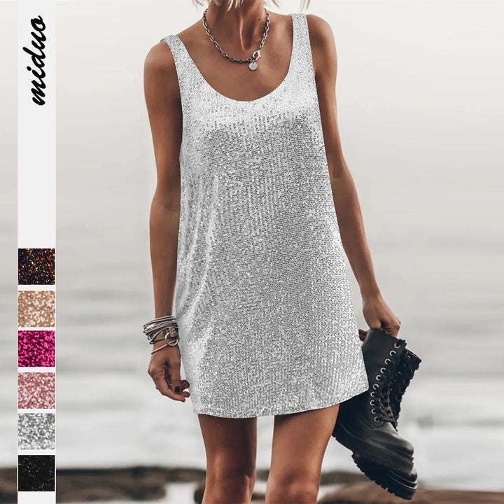 Women's shimmering sequin mini dress, ideal for dazzling parties & night outs.
