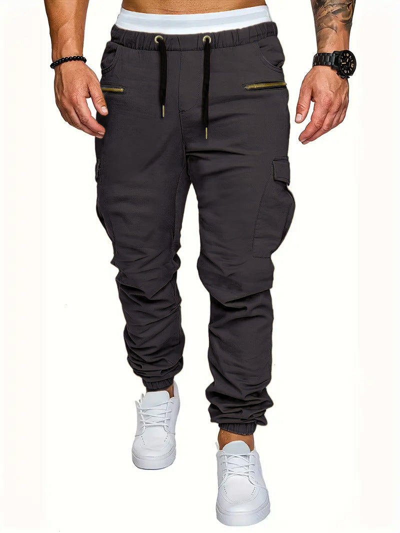 Versatile men's cargo joggers, slim fit, elasticated waist, and zippered pockets for everyday casual comfort.