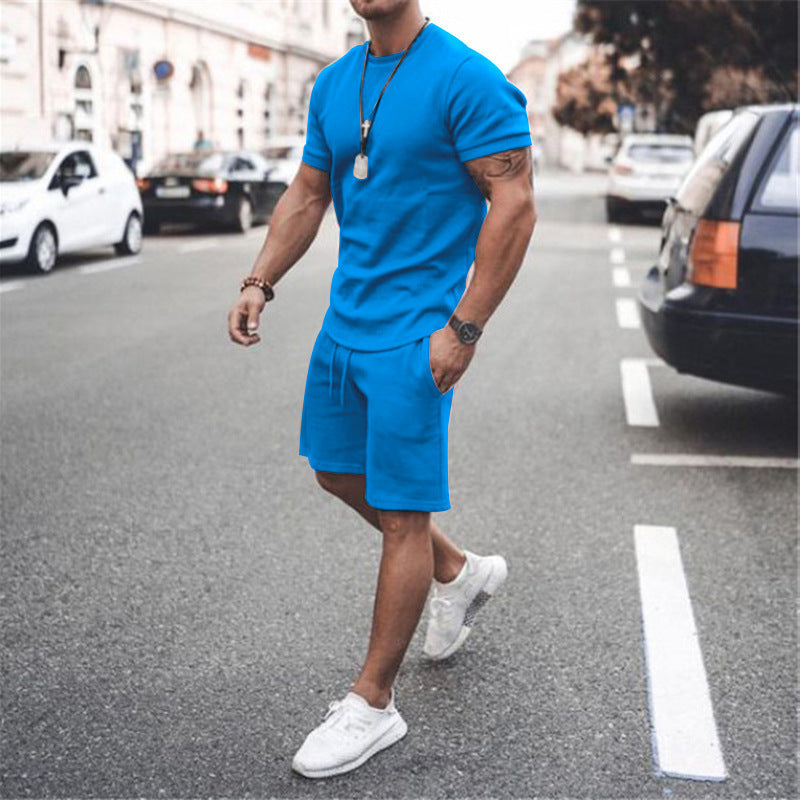 Blue men's active shorts and t-shirt set, ideal for hot weather activities.
