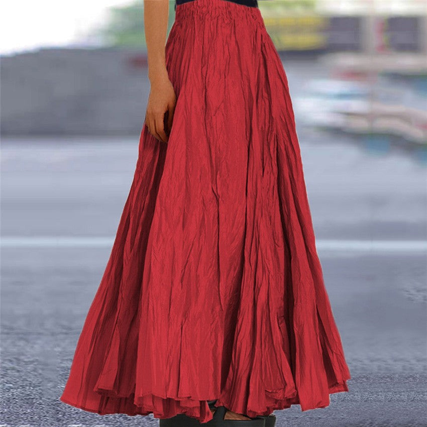 Chic women's long A-line skirt, elastic waist, offering a versatile and flowing silhouette.
