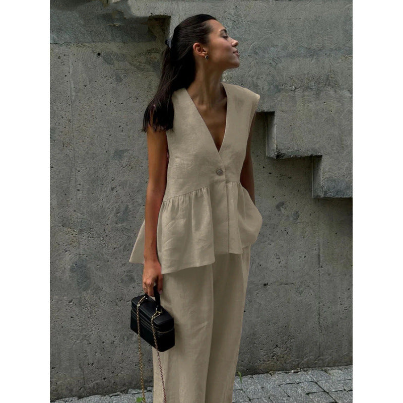 Stylish women's two-piece casual set: V-neck top & relaxed wide-leg pants for summer.