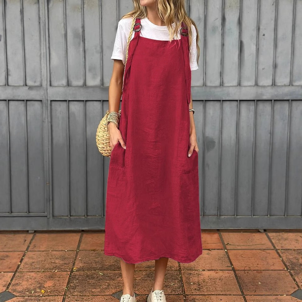 Versatile women's summer A-line dress, sleeveless, featuring handy pockets & adjustable straps.