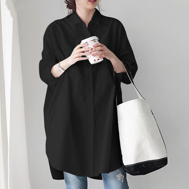 Comfortable women's plus size button-up long sleeve blouse, versatile loose fit tunic.