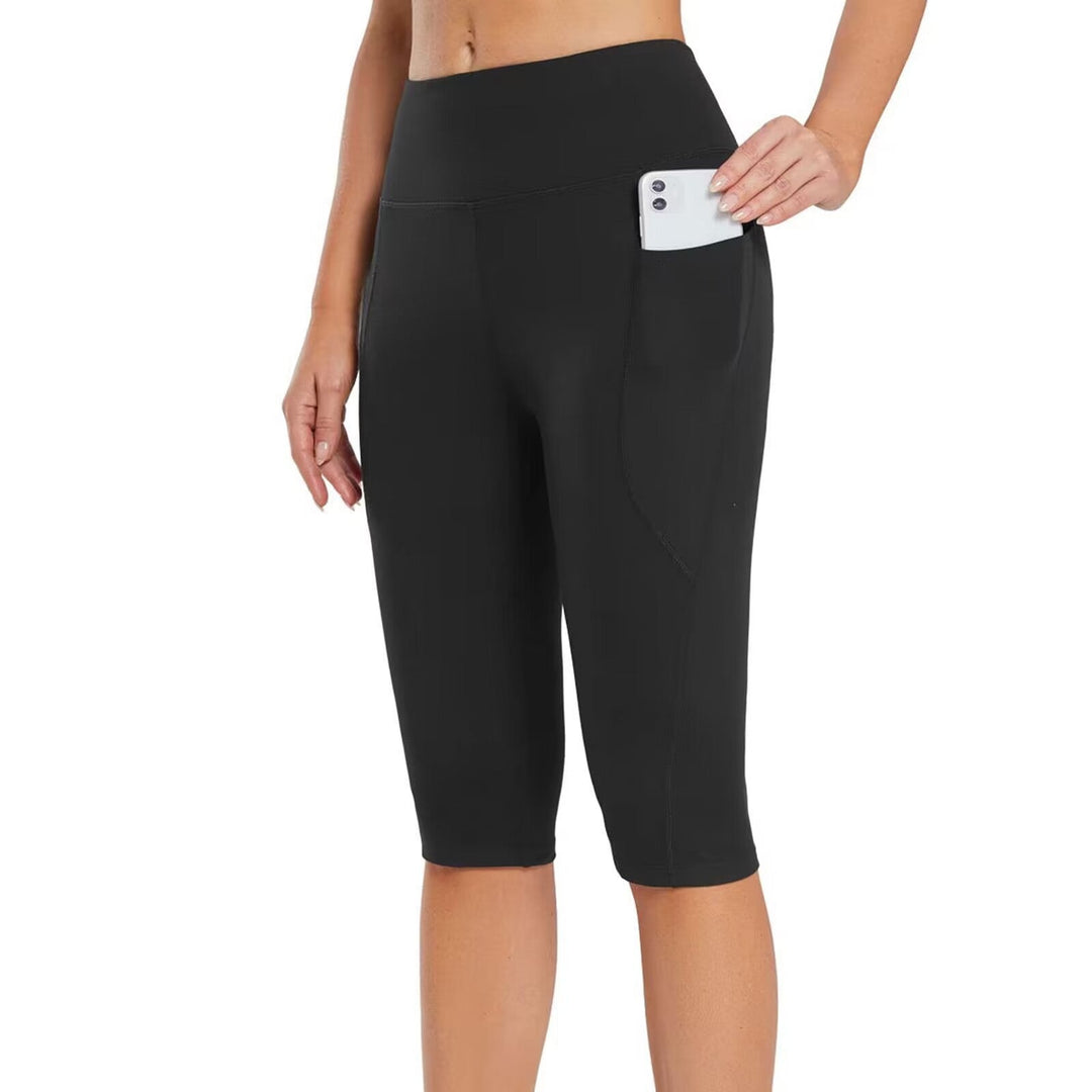 Versatile women's fitness capri pants with convenient side pockets for all activities.