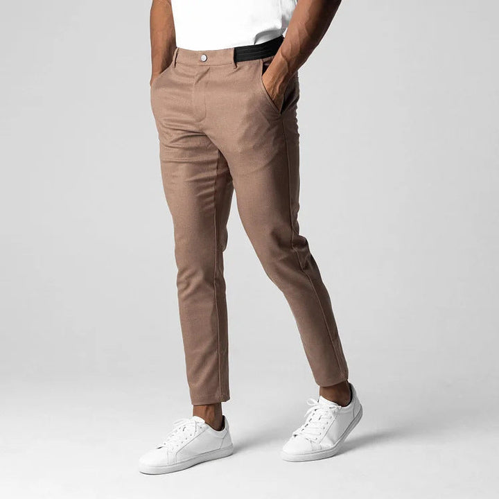 Classic men's slim fit chinos with elastic waistband, essential casual trousers for modern men's fashion.