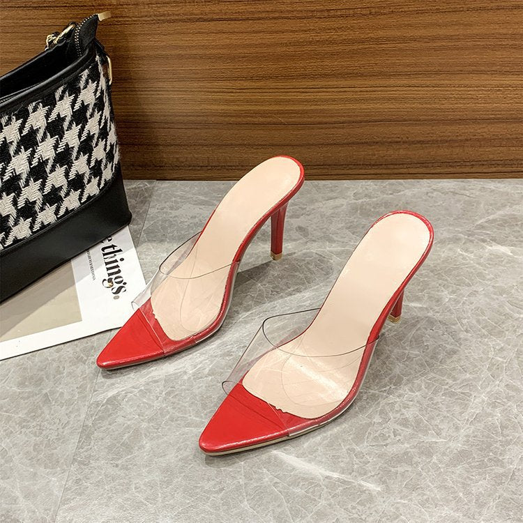 Fashionable slip-on transparent mules with a modern high heel, enhancing any stylish outfit.