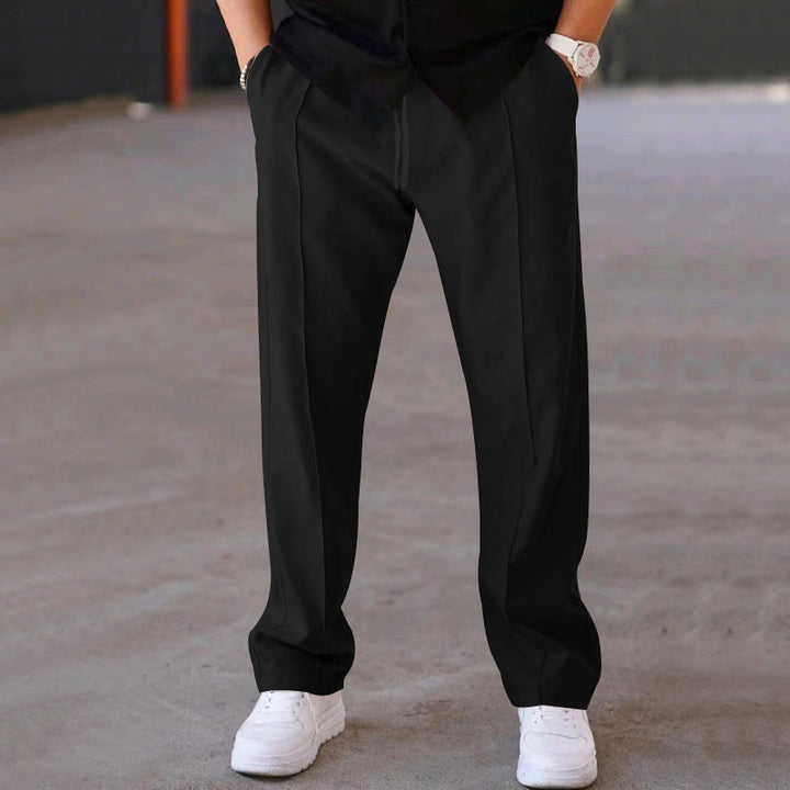 Men's comfortable grey loungewear sweatpants, ideal for relaxing at home with effortless style.