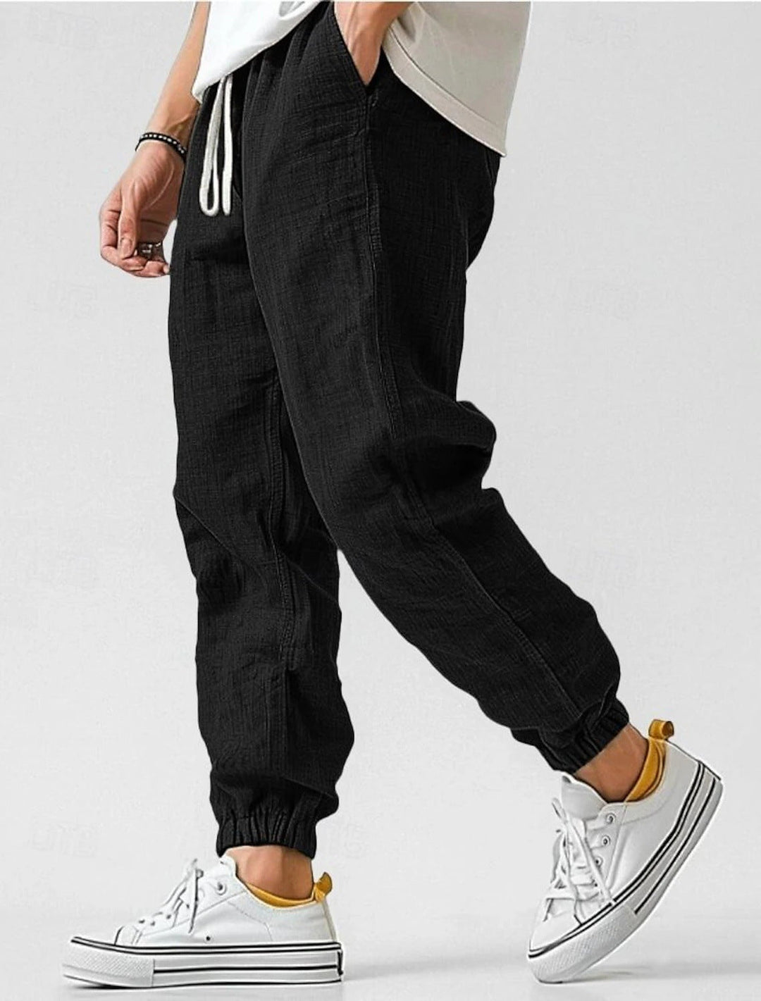Men's comfortable casual pants with elastic waist, drawstring, & pockets. Great for travel.