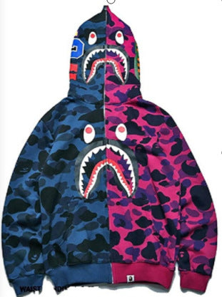 Comfortable women's camouflage hooded sweatshirt. Stylish printed pullover, ideal for active or casual wear.