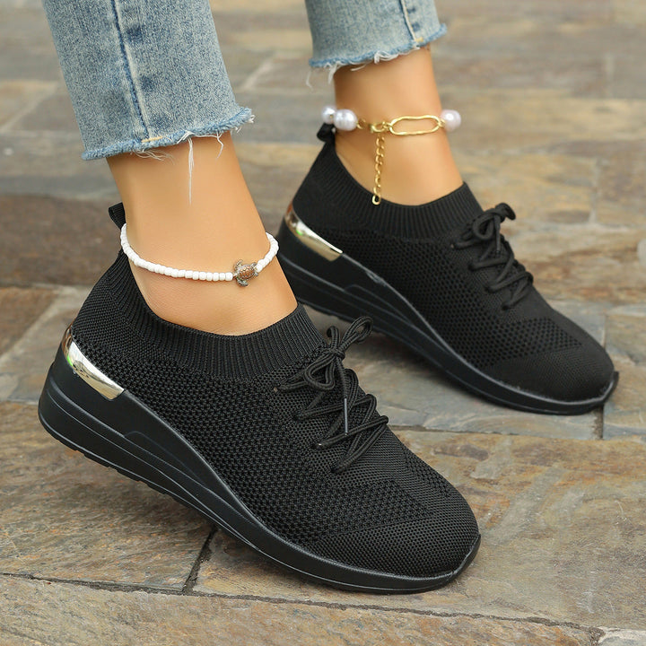 Black ladies platform sport shoes, non-slip sole, secure fit, perfect for active wear & everyday style.