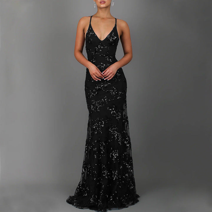 Women's sparkling formal dress for proms & galas. Features a deep back and elegant front slit.