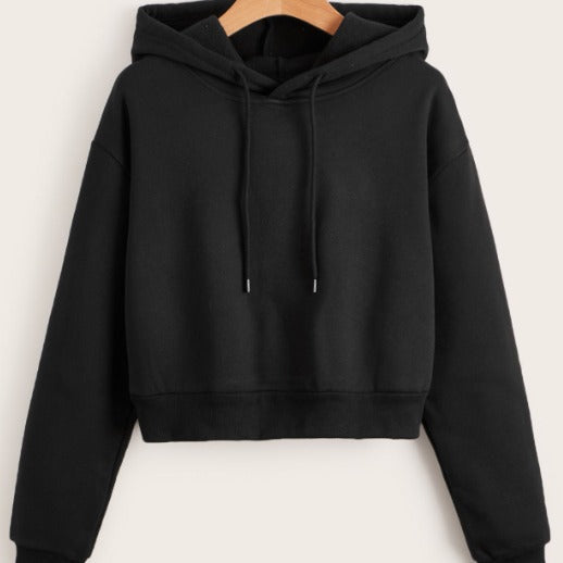 Trendy women's cropped hoodie in soft fabric, perfect for casual everyday style.