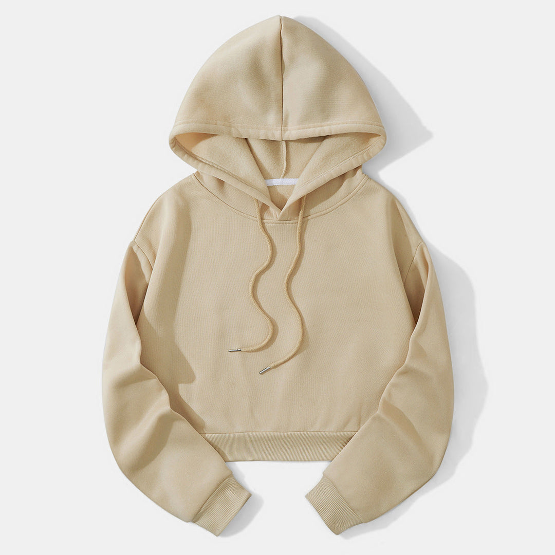 Detail of drawstrings on a women's comfortable cropped pullover hoodie.
