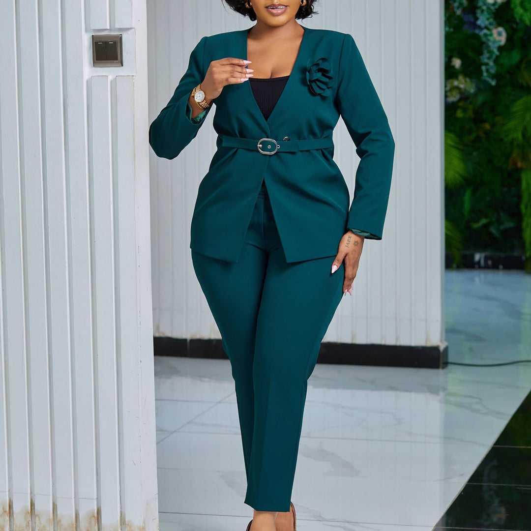 Elegant women's blazer & pant suit with belt and subtle floral detail, perfect for business casual.